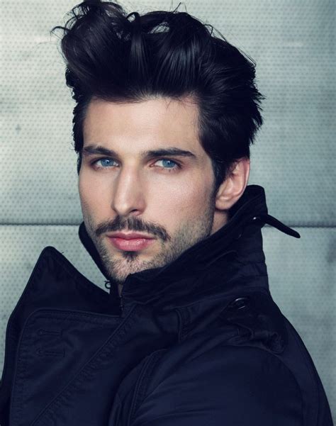 man with black hair and blue eyes|dark haired guy blue eyes.